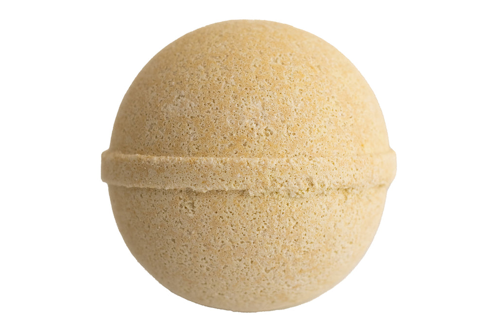 Beige bath bomb on a white background