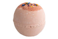 Bath bomb with colorful sprinkles on a white background